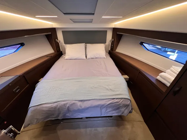  Yacht Photos Pics Luxurious cabin interior of 2023 Prestige 520 yacht with cozy bed and modern design.