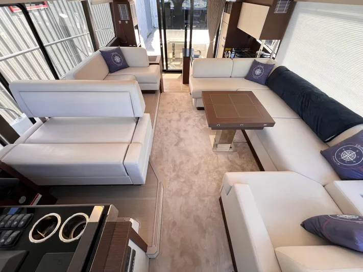  Yacht Photos Pics Luxurious interior of a 2023 Prestige 520 yacht with elegant seating and modern design.
