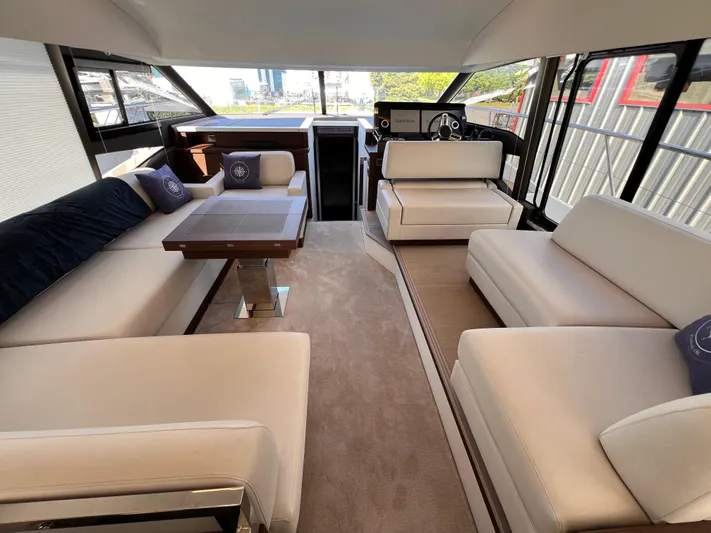  Yacht Photos Pics Luxurious interior of 2023 Prestige 520 yacht with elegant seating and modern design.