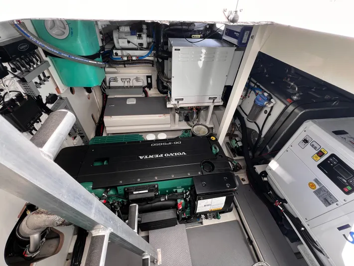  Yacht Photos Pics Engine room of 2023 Prestige 520 yacht with Volvo Penta engine and modern equipment.