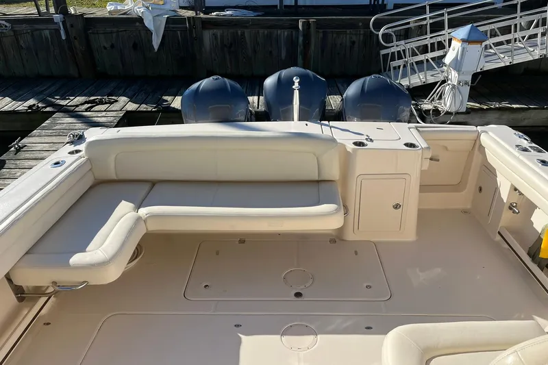  Yacht Photos Pics 2015 Grady-White Freedom 375 boat interior with seating and outboard motors.