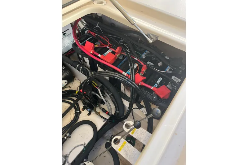  Yacht Photos Pics Engine compartment of 2015 Grady-White Freedom 375 boat with visible wiring and components.
