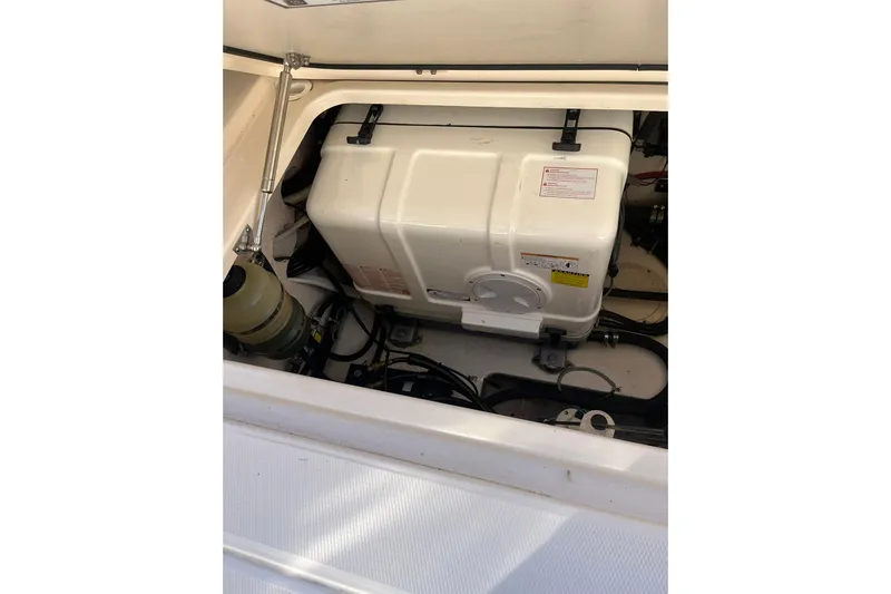  Yacht Photos Pics Engine compartment of 2015 Grady-White Freedom 375 boat, showcasing generator and components.