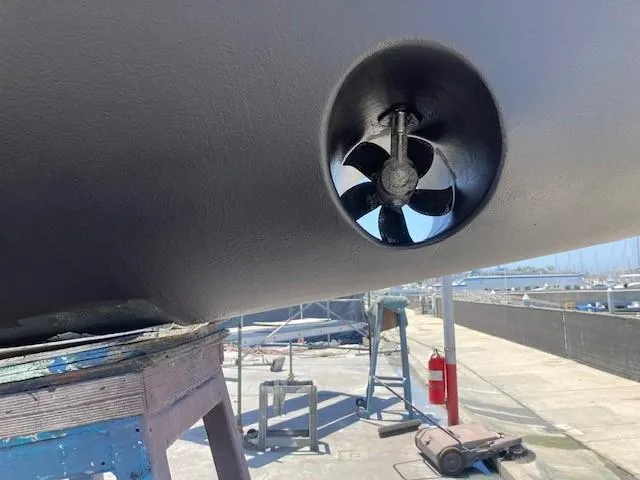 Nina Mia Yacht Photos Pics Bow thruster on a 2018 Catalina 385 sailboat in a shipyard.