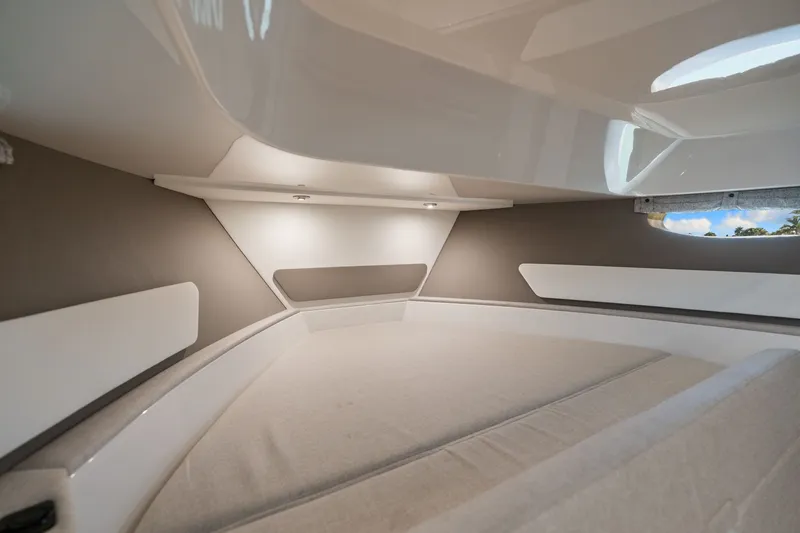  Yacht Photos Pics 2023 Sea Ray 370 Sundancer cabin interior with modern design and soft lighting.