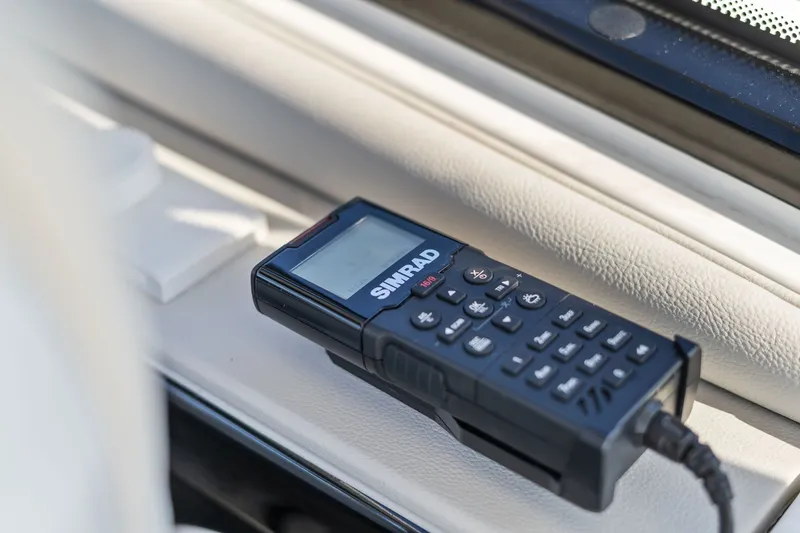  Yacht Photos Pics Simrad marine radio on 2023 Sea Ray 370 Sundancer boat dashboard.