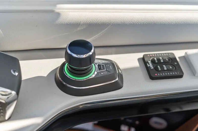  Yacht Photos Pics Joystick control on 2023 Sea Ray 370 Sundancer boat dashboard.