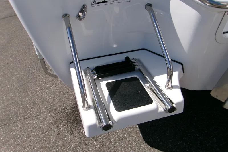  Yacht Photos Pics 2026 Sportsman Masters 267OE Bay Boat swim platform with retractable ladder.