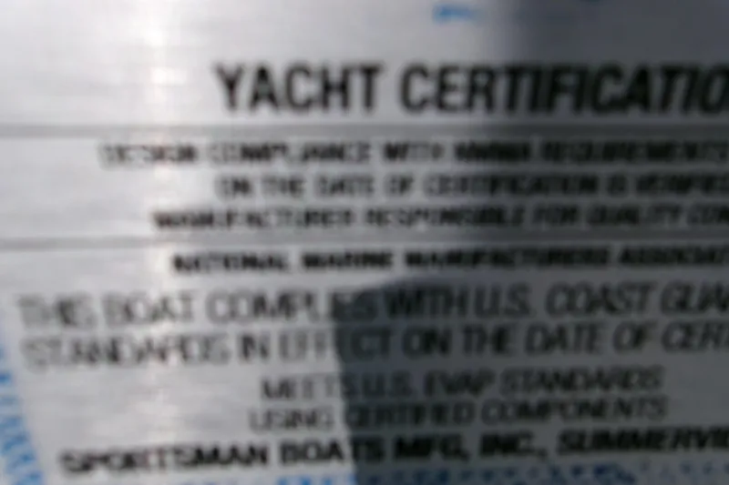  Yacht Photos Pics Blurry yacht certification label for 2026 Sportsman Masters 267OE Bay Boat.