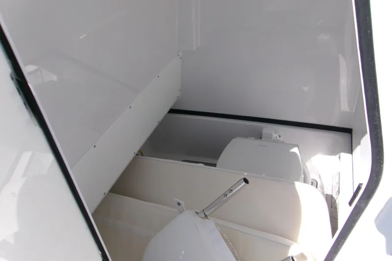  Yacht Photos Pics 2026 Sportsman Masters 267OE Bay Boat interior storage compartment.