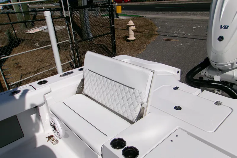  Yacht Photos Pics 2026 Sportsman Masters 267OE Bay Boat with white seating and V8 engine.