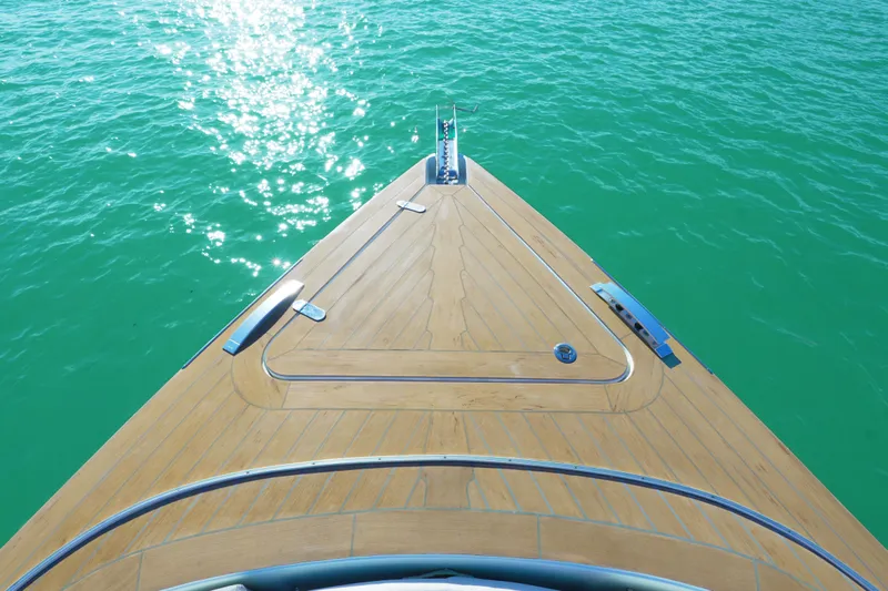  Yacht Photos Pics Bow of 2018 Fjord 36 Xpress yacht on clear turquoise water.