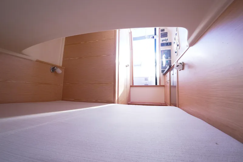  Yacht Photos Pics Interior cabin view of 2018 Fjord 36 Xpress, featuring wooden paneling and modern design.