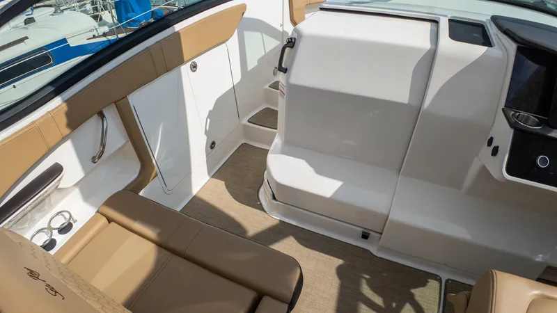 At Times Yacht Photos Pics 2019 Sea Ray Sundancer 320 interior with tan seating and modern design.