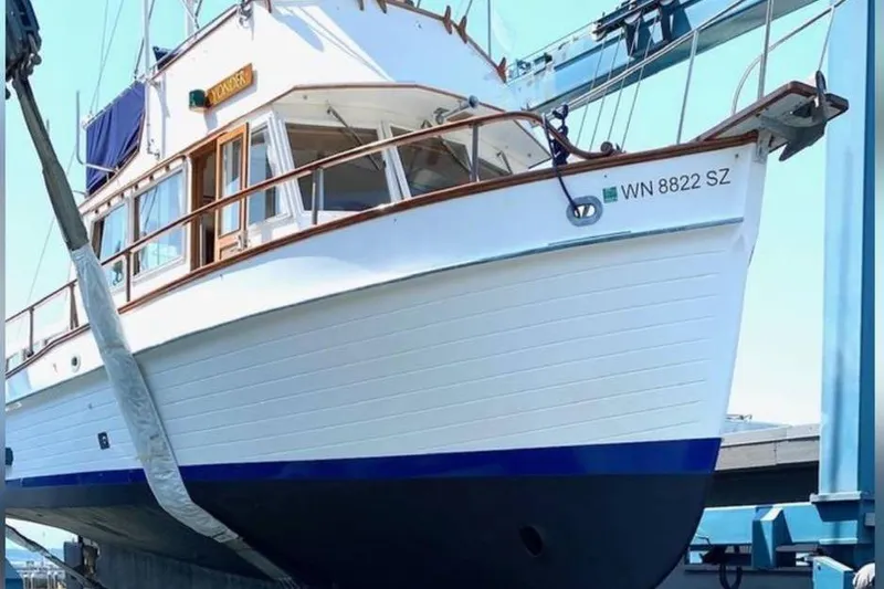 Yonder Yacht Photos Pics 1984 Grand Banks 36 Classic yacht on a lift, showcasing its elegant design.