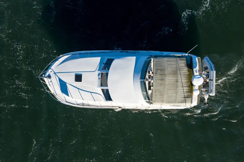  Yacht Photos Pics Aerial view of 2003 Navigator 3900 yacht cruising on open water.