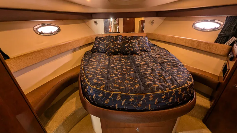  Yacht Photos Pics Luxurious cabin interior of 2008 Meridian 341 Sedan yacht with elegant bedding.