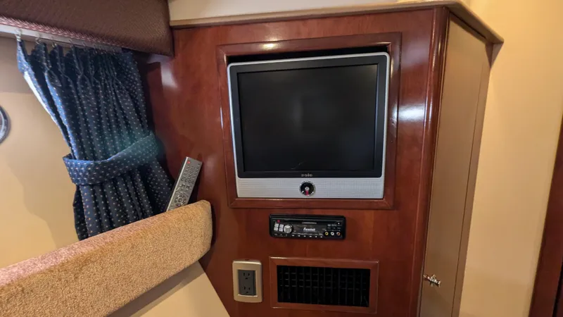 Yacht Photos Pics 2008 Meridian 341 Sedan interior with TV and entertainment system.
