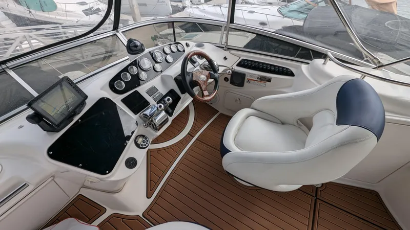  Yacht Photos Pics 2008 Meridian 341 Sedan helm with modern controls and luxurious seating.