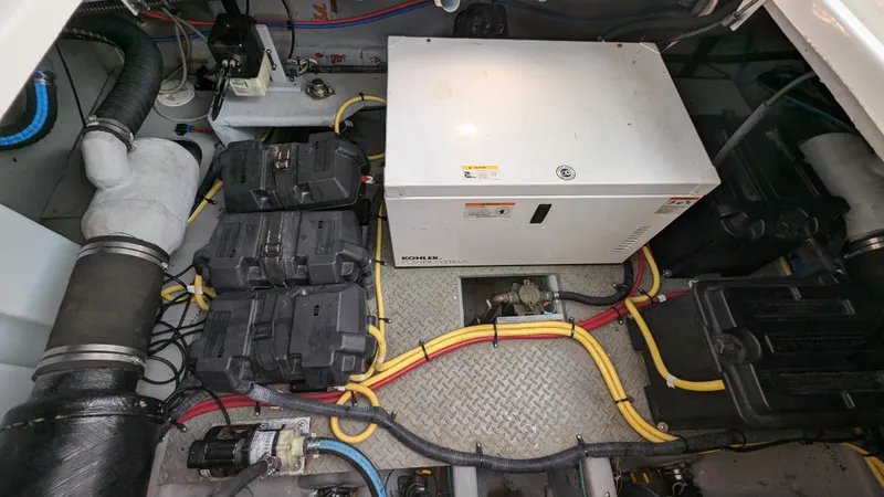  Yacht Photos Pics Engine room of a 2008 Meridian 341 Sedan with visible wiring and equipment.