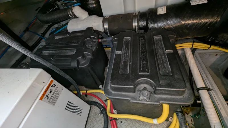  Yacht Photos Pics Battery compartment of a 2008 Meridian 341 Sedan with wiring and ventilation.