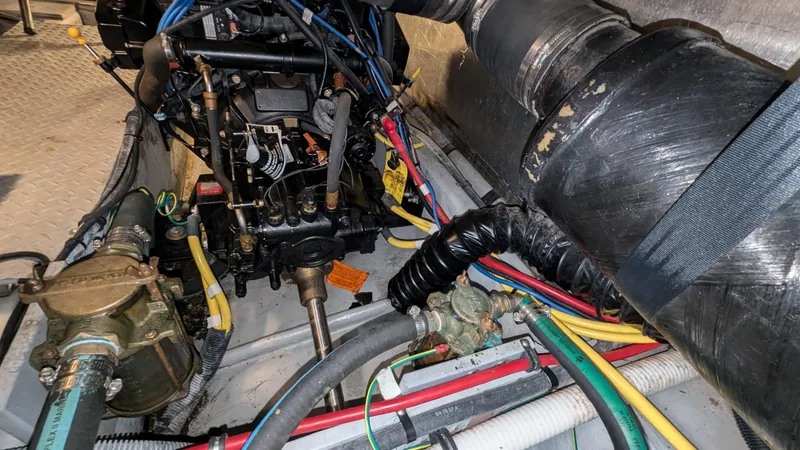  Yacht Photos Pics Engine compartment of a 2008 Meridian 341 Sedan with visible wiring and components.