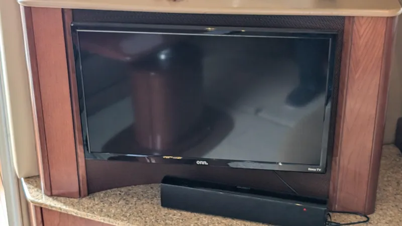  Yacht Photos Pics Flat-screen TV and soundbar in 2008 Meridian 341 Sedan interior.