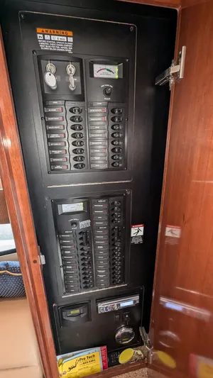  Yacht Photos Pics Electrical panel inside 2008 Meridian 341 Sedan yacht, featuring circuit breakers and controls.