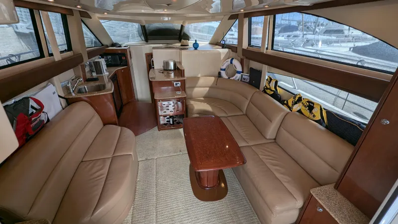  Yacht Photos Pics Luxurious interior of a 2008 Meridian 341 Sedan yacht with beige leather seating.