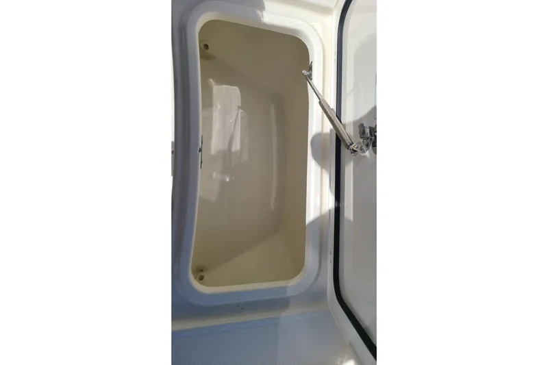 Timber Yacht Photos Pics Open storage compartment on 2023 Boston Whaler 330 Outrage boat.
