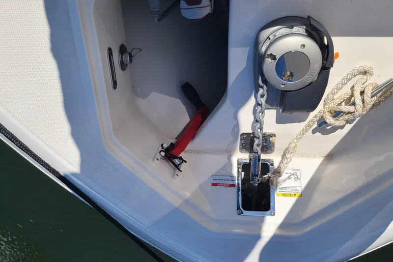 Timber Yacht Photos Pics 2023 Boston Whaler 330 Outrage anchor system with chain and rope detail.