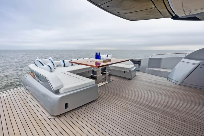 Our Trade Yacht Photos Pics Luxury deck seating on 2021 Riva 88' FOLGORE yacht with ocean view.
