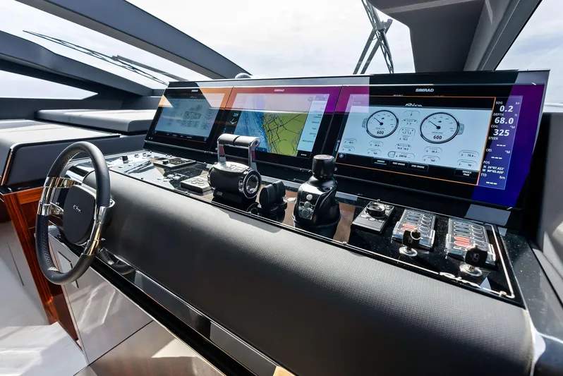 Our Trade Yacht Photos Pics Modern helm station of 2021 Riva 88' FOLGORE yacht with advanced navigation displays.