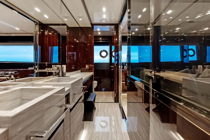 Our Trade Yacht Photos Pics Luxurious bathroom interior of 2021 Riva 88' FOLGORE yacht with modern fixtures and ocean view.