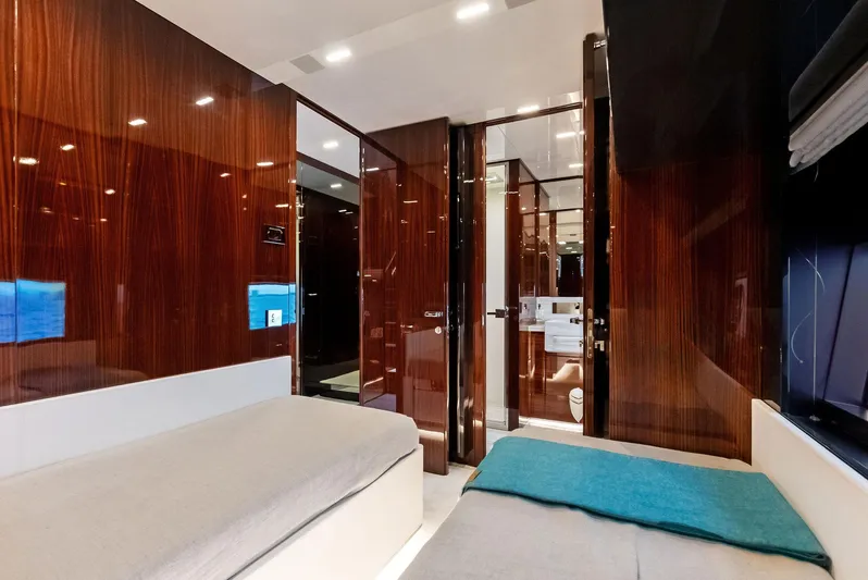 Our Trade Yacht Photos Pics Luxurious interior cabin of 2021 Riva 88' FOLGORE yacht with modern wood finishes.