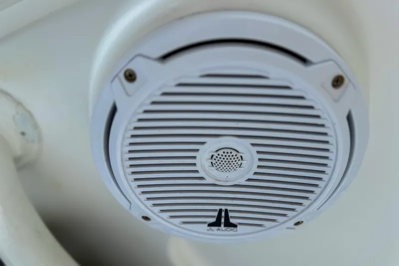  Yacht Photos Pics White JL Audio speaker on 2011 Edgewater 318CC boat interior.