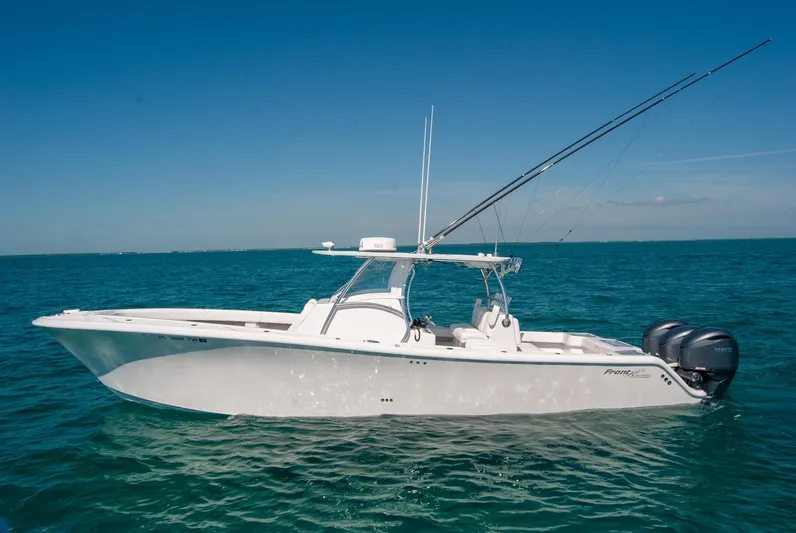 Yacht Photos Pics 2025 Front Runner 36 Center Console boat on clear blue water.