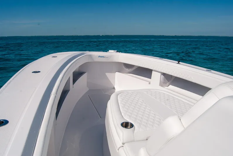 Yacht Photos Pics 2025 Front Runner 36 Center Console boat on open water, featuring sleek white seating.