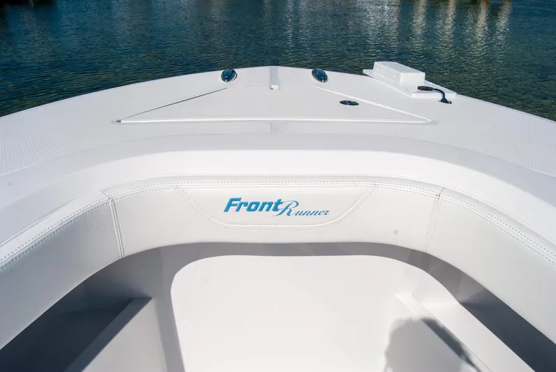  Yacht Photos Pics 2025 Front Runner 36 Center Console boat, white interior, on calm water.