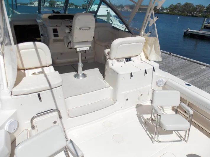  Yacht Photos Pics 2015 Grady-White Express 370 boat interior with seating, helm, and waterfront view.