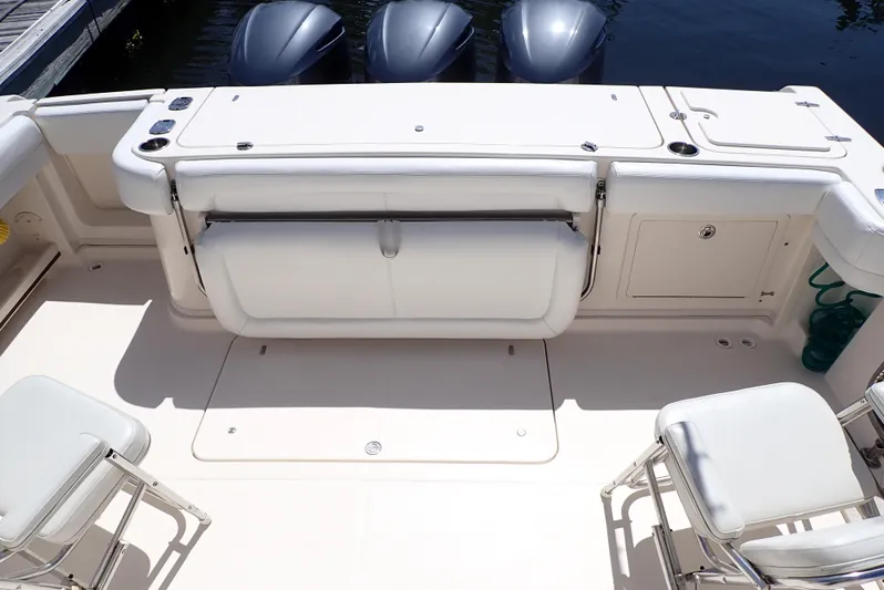  Yacht Photos Pics 2015 Grady-White Express 370 boat deck with seating and outboard motors.