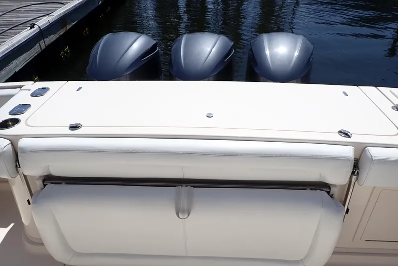 Yacht Photos Pics 2015 Grady-White Express 370 boat with triple outboard engines at dock.