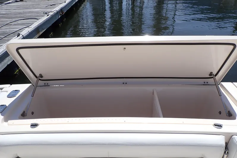 Yacht Photos Pics Open storage compartment on a 2015 Grady-White Express 370 boat by the dock.