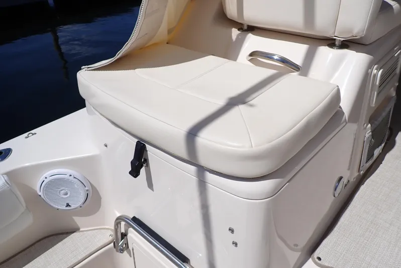  Yacht Photos Pics Cushioned seating on 2015 Grady-White Express 370 boat, featuring sleek design and built-in speaker.