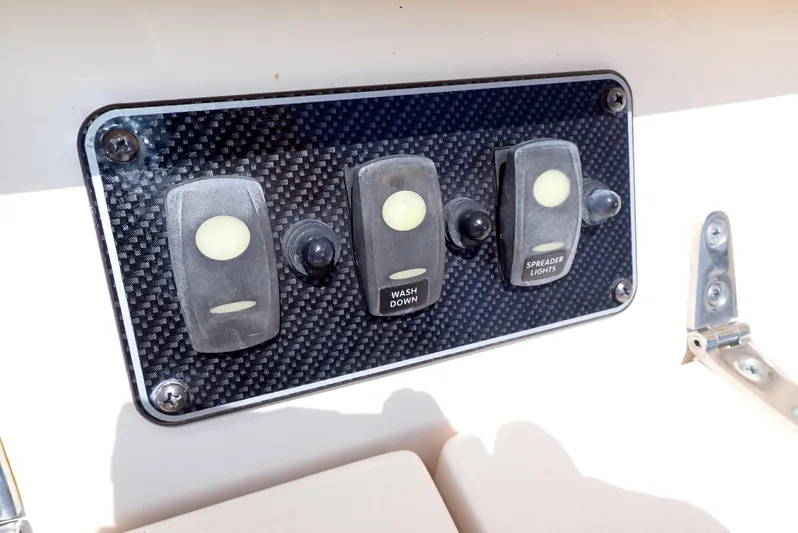  Yacht Photos Pics Control panel on 2015 Grady-White Express 370 boat with switches for washdown and spreader lights.