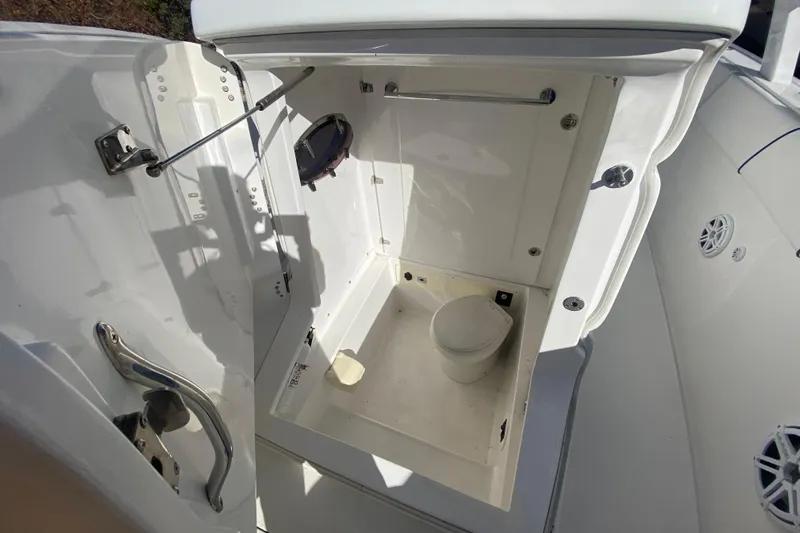  Yacht Photos Pics 2017 Midnight Express 39S Cuddy boat bathroom interior with toilet and hatch.