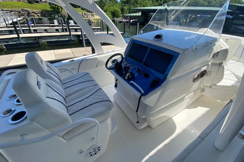  Yacht Photos Pics 2017 Midnight Express 39S Cuddy boat interior with helm and seating.