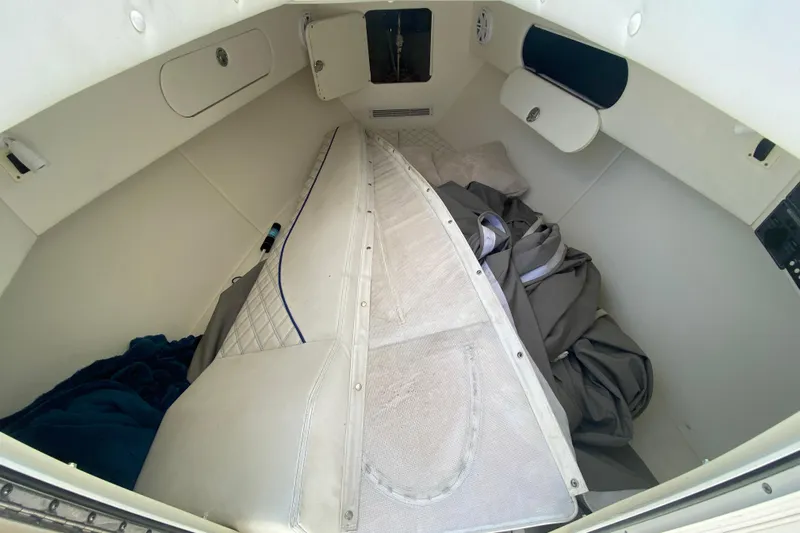  Yacht Photos Pics 2017 Midnight Express 39S Cuddy interior with white upholstery and storage compartments.