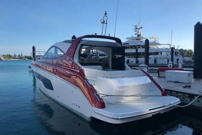  Yacht Photos Pics Azimut Nexus X47 2020 luxury yacht docked at marina, sleek design, red and white exterior.