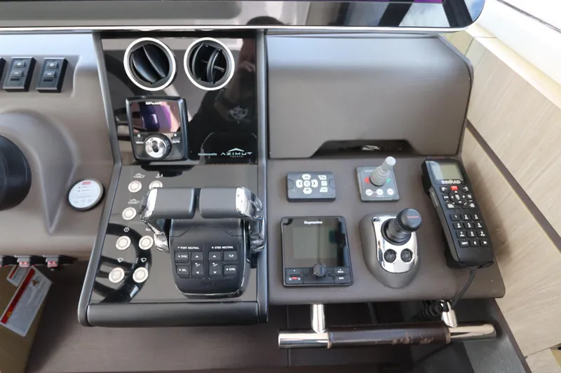  Yacht Photos Pics Control panel of 2020 Azimut Nexus X47 yacht with advanced navigation equipment.